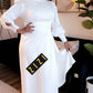 Model wearing Aaliyah Satin Evening Dress in a White Color. Available at ZIZI Boutique in Minneapolis.