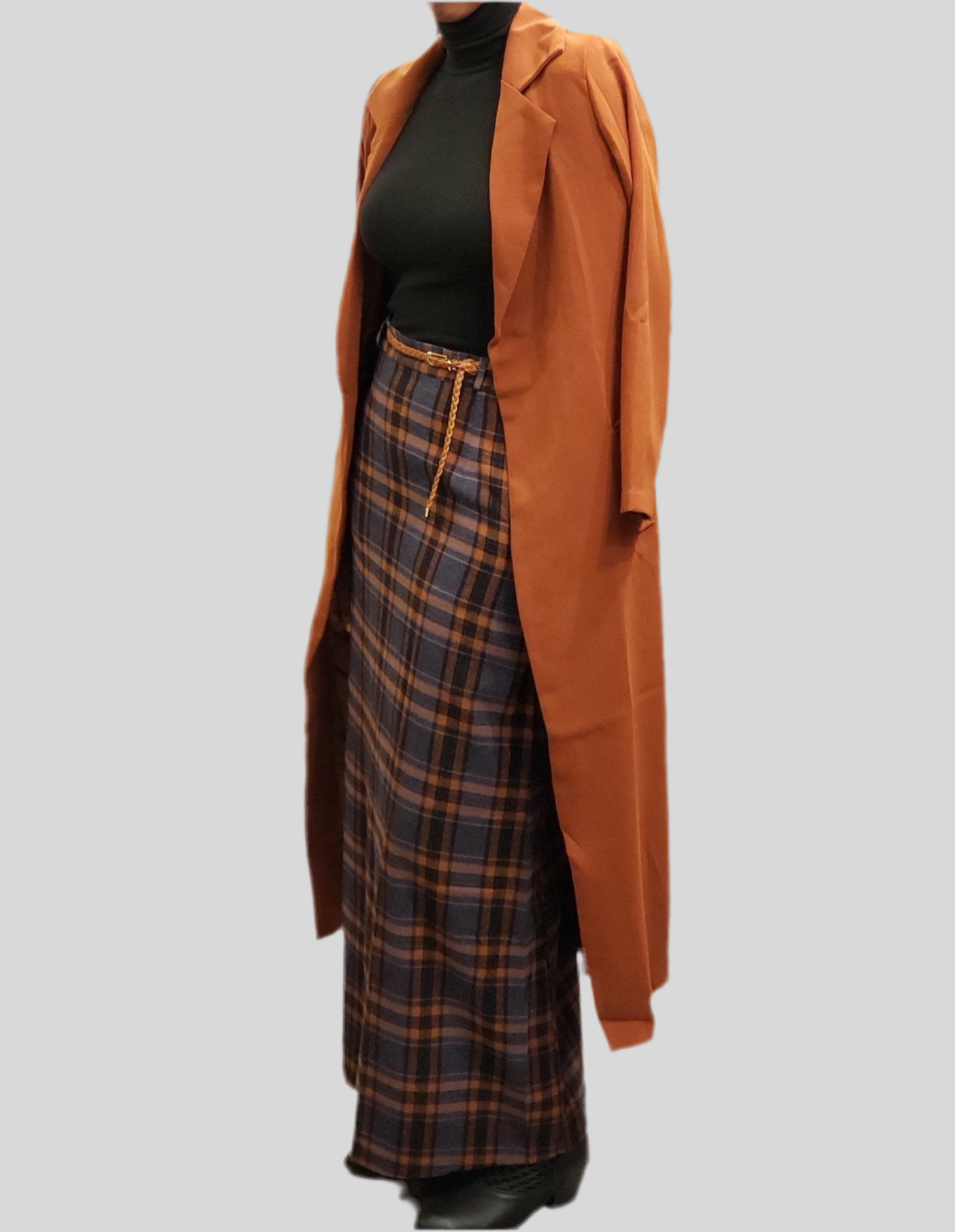 Plaid Print Women's Winter Maxi Skirt styled with black turtleneck and long rust-colored coat