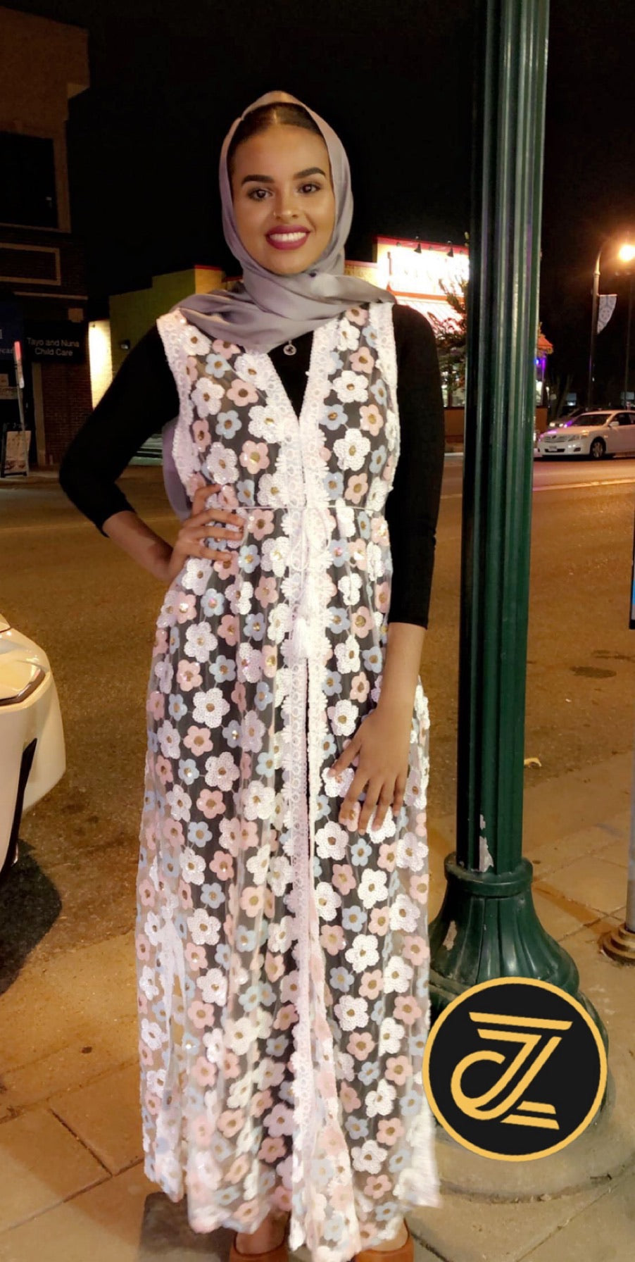 ZIZI Floral Design Sleeveless White Vest Abaya featuring a floral pattern and elegant button details