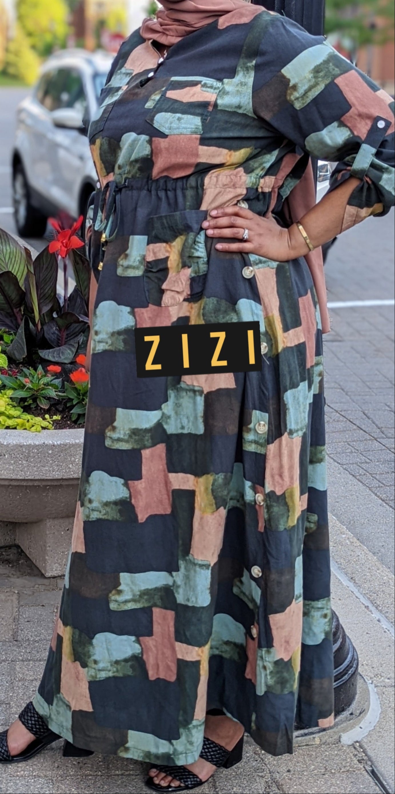 Woman wearing ZIZI Boutique ZZ Linen Dress Blocks Drawstring Print in abstract block pattern with long sleeves