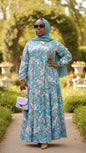Anaam Print Maxi Dress in a Light Blue Turquoise Color with Paisley Print design available at ZIZI Boutique