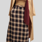 Plaid Print Women's Winter Maxi Skirt paired with beige coat and maroon scarf from ZIZI Boutique