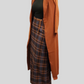Plaid Print Women's Winter Maxi Skirt styled with black turtleneck and long rust-colored coat