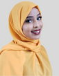 ZIZI chiffon hijab in mustard yellow worn by smiling woman with flawless makeup
