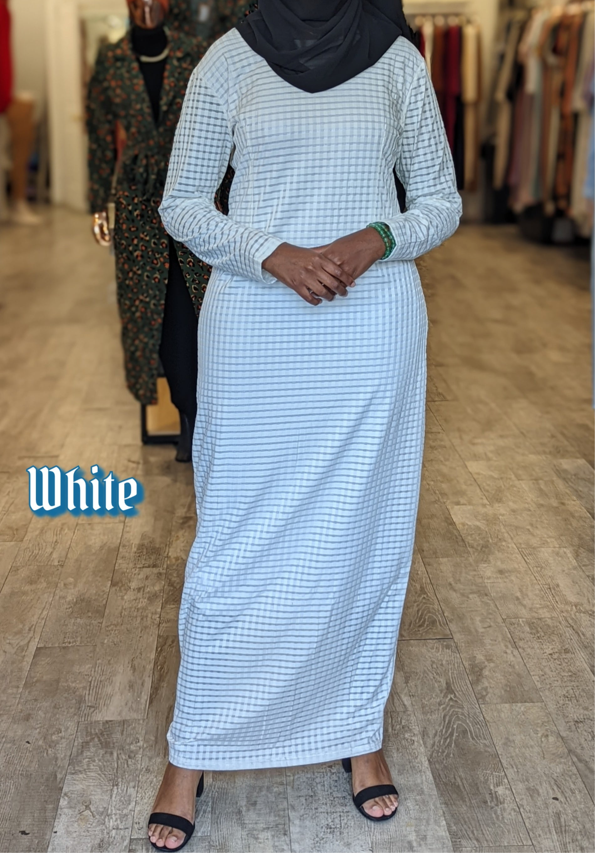 ZIZI white Checkered Color Maxi Dress with long sleeves and a modest design worn with black sandals