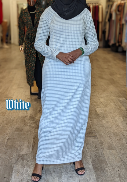 ZIZI white Checkered Color Maxi Dress with long sleeves and a modest design worn with black sandals