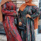 Two women wearing Zoraa Summer Print Maxi Dress in red and green with brown hijabs and sunglasses outdoors