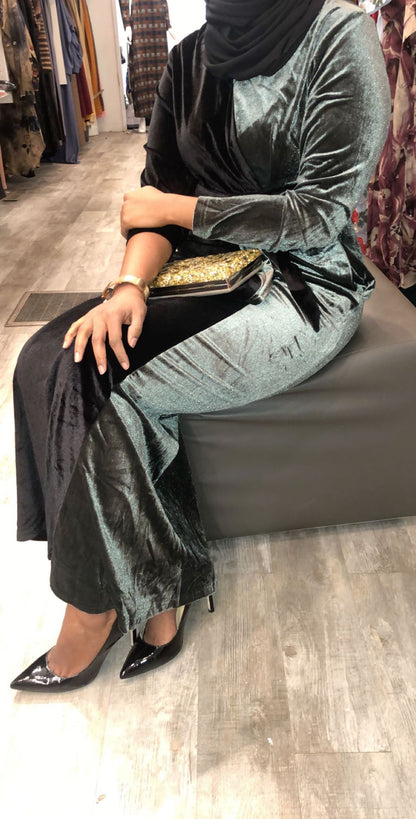 Colorblock Two Tone Velvet Evening Dress in teal and black, styled with a clutch and heels