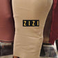 Free Size Women's Sweater Maxi Skirt in beige worn with black ankle boots from ZIZI Boutique