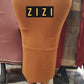 Free Size Women's Sweater Maxi Skirt in camel brown from ZIZI Boutique, styled with black ankle boots