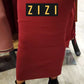 Free Size Women's Sweater Maxi Skirt in deep red modeled with black ankle boots from ZIZI Boutique