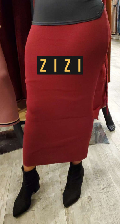 Free Size Women's Sweater Maxi Skirt in deep red modeled with black ankle boots from ZIZI Boutique