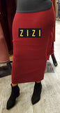 Free Size Women's Sweater Maxi Skirt in deep red modeled with black ankle boots from ZIZI Boutique