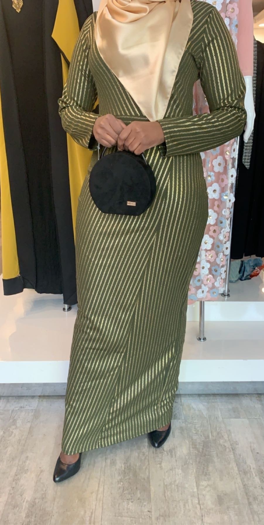 Elegant Gold Links Evening Dress from ZIZI Boutique featuring long sleeves and a sophisticated silhouette