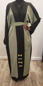 Elegant Qalanjo Design Abaya Eid Collection in green and black with a stylish belt from ZIZI Boutique