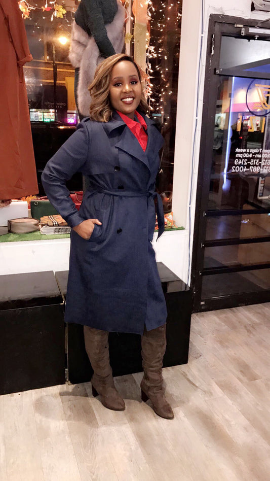 ZIZI Boutique Suede Trench Coat Navy Blue worn by a woman styled with brown boots and red blouse