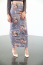 ZIZI Suede Winter Print Maxi Skirt in purple with pink floral design worn with beige heels