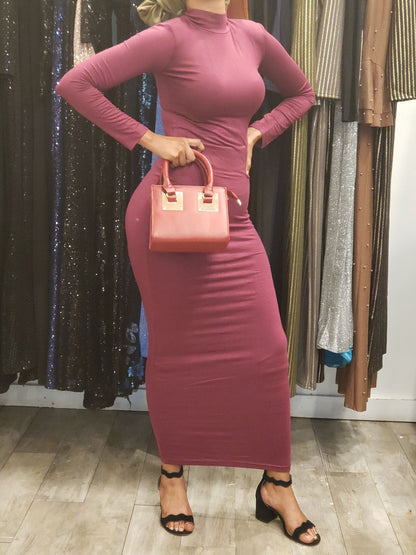 Zipper Maxi Dress from ZIZI Boutique in plum color, styled with a pink handbag and strappy heels
