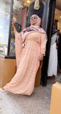 ZIZI Boutique Yani Stripe Butterfly Maxi Dress Modest Fashion in soft pink worn by a stylish woman outside a boutique