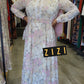 Elegant Chiffon Floral Print Maxi Dress from ZIZI Boutique, featuring long sleeves and a flowing design