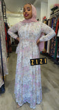 Elegant Chiffon Floral Print Maxi Dress from ZIZI Boutique, featuring long sleeves and a flowing design