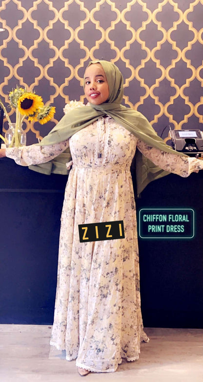 Elegant Chiffon Floral Print Maxi Dress from ZIZI Boutique with a flowing design and long sleeves