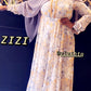 Chiffon Floral Print Maxi Dress from ZIZI Boutique with long sleeves and floral design