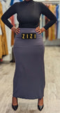 ZIZI Boutique Essential Jersey Maxi Skirt in grey, styled with a black top and heels for a chic look