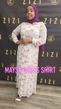 ZIZI Boutique Maysa Print Dress maxi dress with pink floral pattern worn by woman with purple hijab