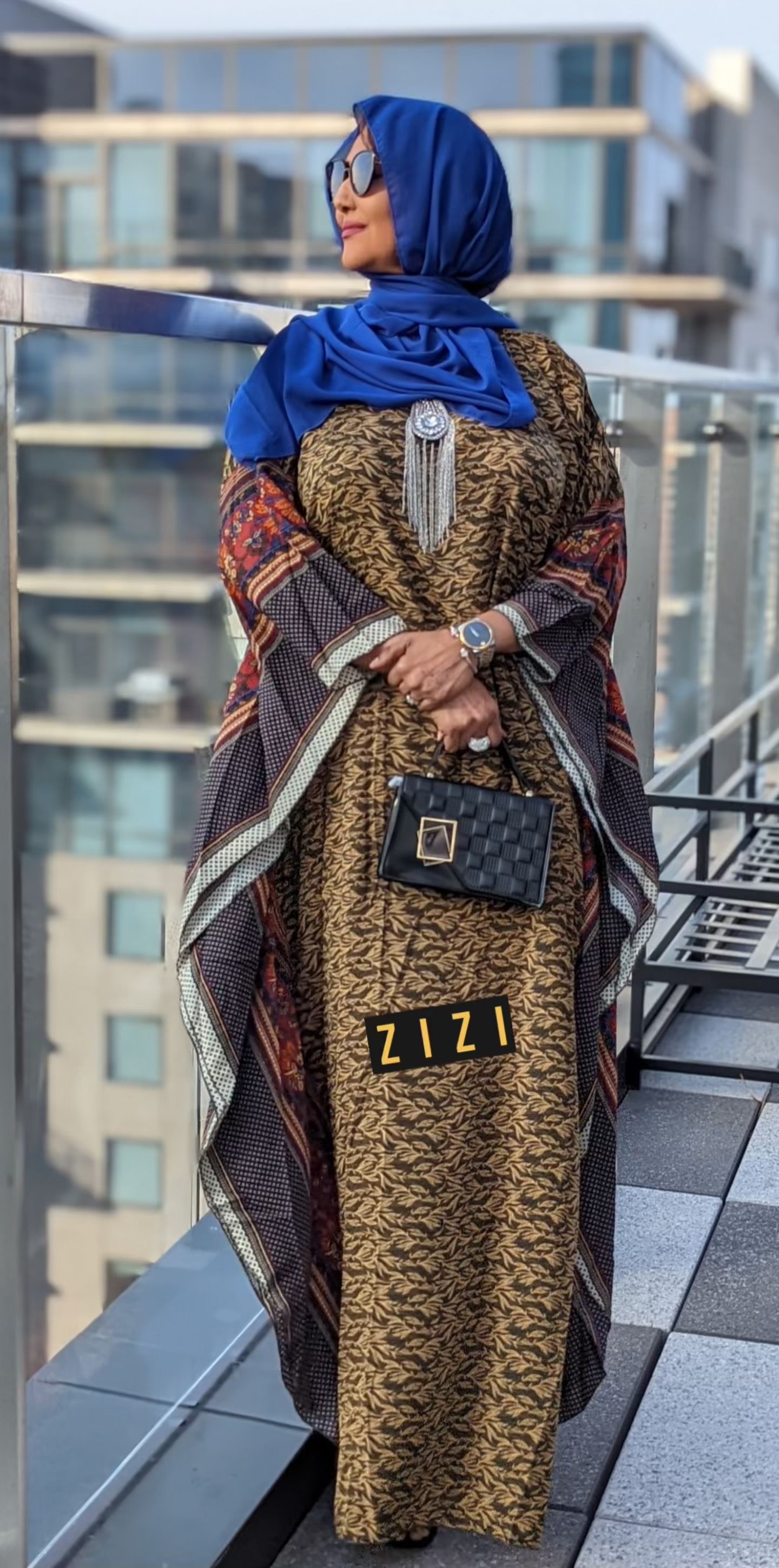 ZIZI modest butterfly print dress with elegant details, perfect for stylish and chic occasions.