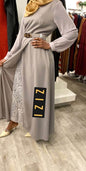 Elegant ZIZI Boutique modest lace dress in grey, featuring a belted waist and long sleeves