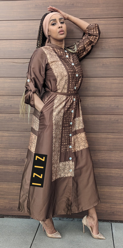 Woman wearing a brown Satin Silk Maxi Print Dress Shirt with button details and a waist belt