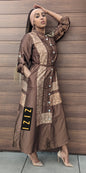 Woman wearing a brown Satin Silk Maxi Print Dress Shirt with button details and a waist belt