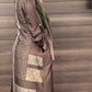 Woman wearing a Satin Silk Maxi Print Dress Shirt by ZIZI Boutique with detailed patterns and long sleeves