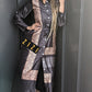 Woman wearing a Satin Silk Maxi Print Dress Shirt by ZIZI Boutique with black and brown pattern and button details