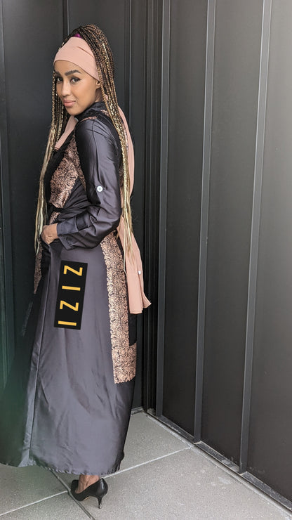 Woman wearing a Satin Silk Maxi Print Dress Shirt with snake print details and long sleeves