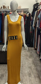 Sleeveless Bodycon Cotton Jersey Maxi Dress in mustard yellow displayed on a mannequin at ZIZI Boutique
