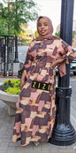 Woman wearing ZZ Linen Dress Blocks Drawstring Print dress with geometric pattern from ZIZI Boutique